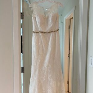 Elegant Kleinfield Lace Wedding Dress with Gold Accents